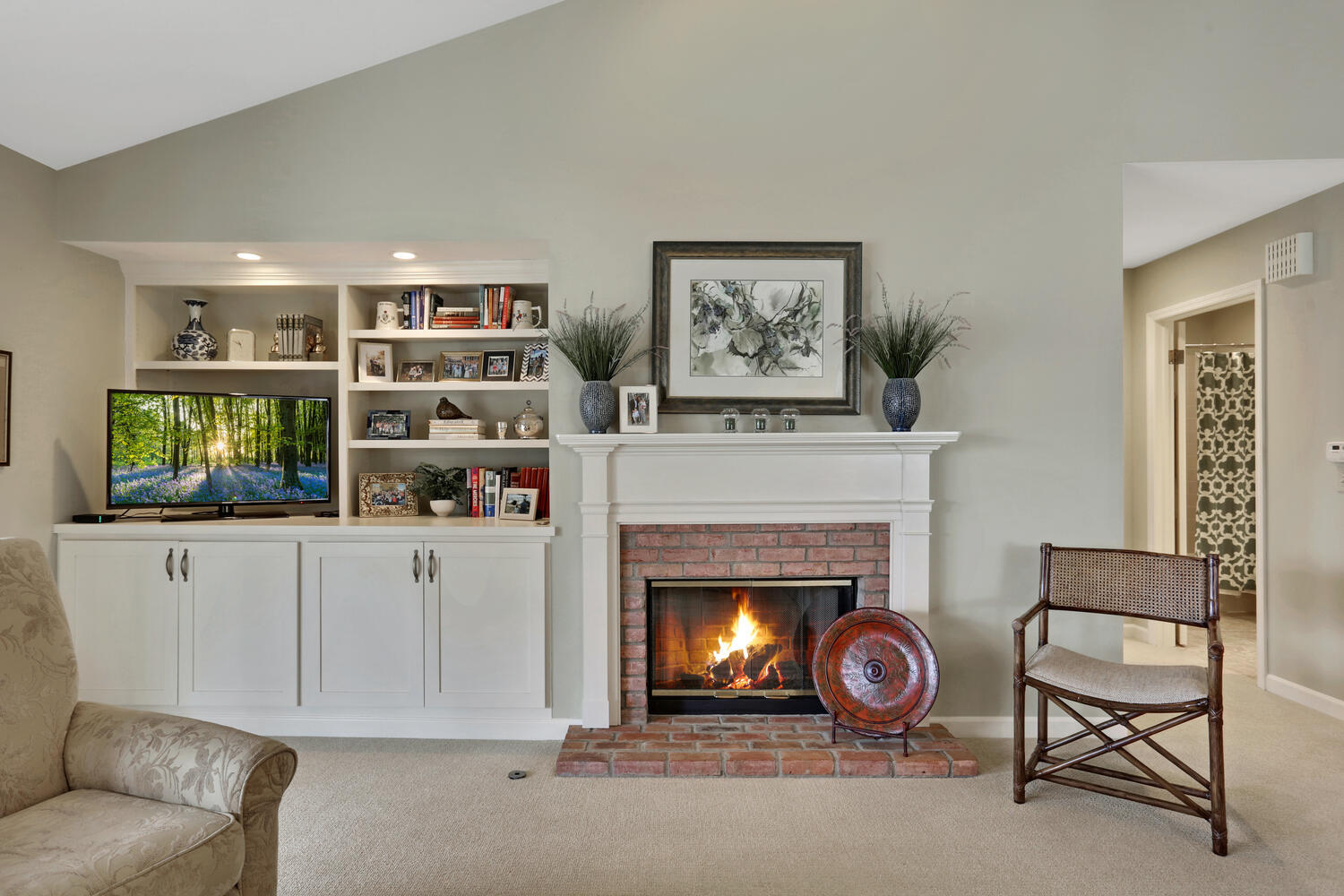 1727 Lakeside Drive, Unit B Champaign, IL 61821 - Photo 8 of 35 a living room with furniture a fireplace and a window
