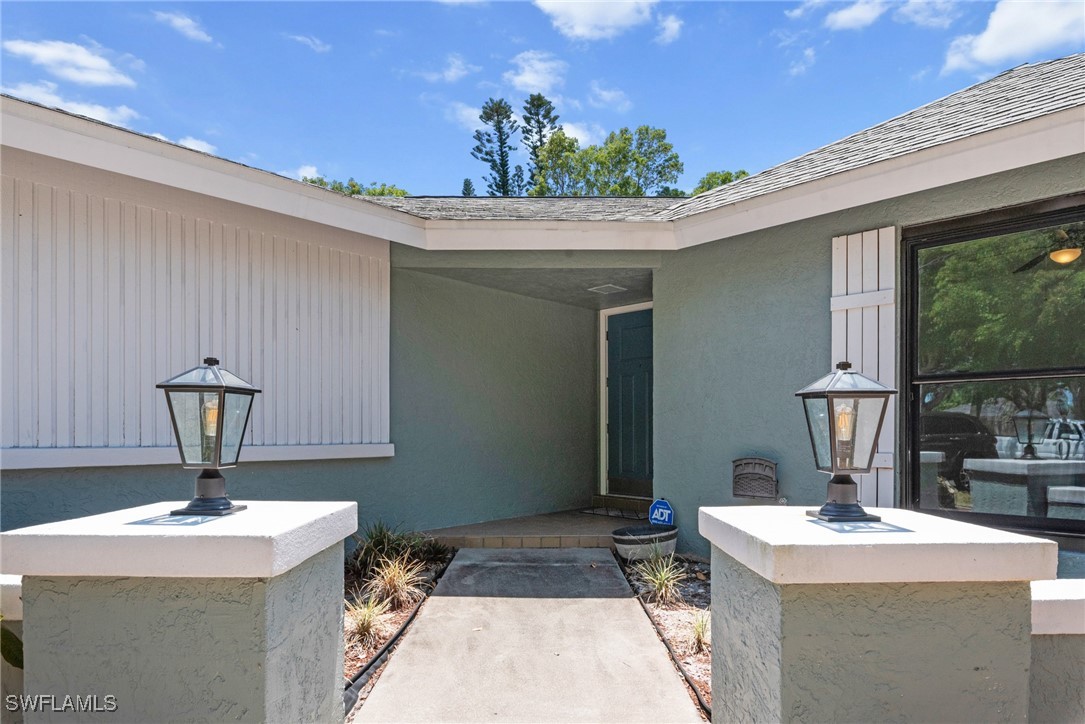 12331 McGregor Boulevard Fort Myers, FL 33919 - Photo 1 of 46 a kitchen with a sink and a stove