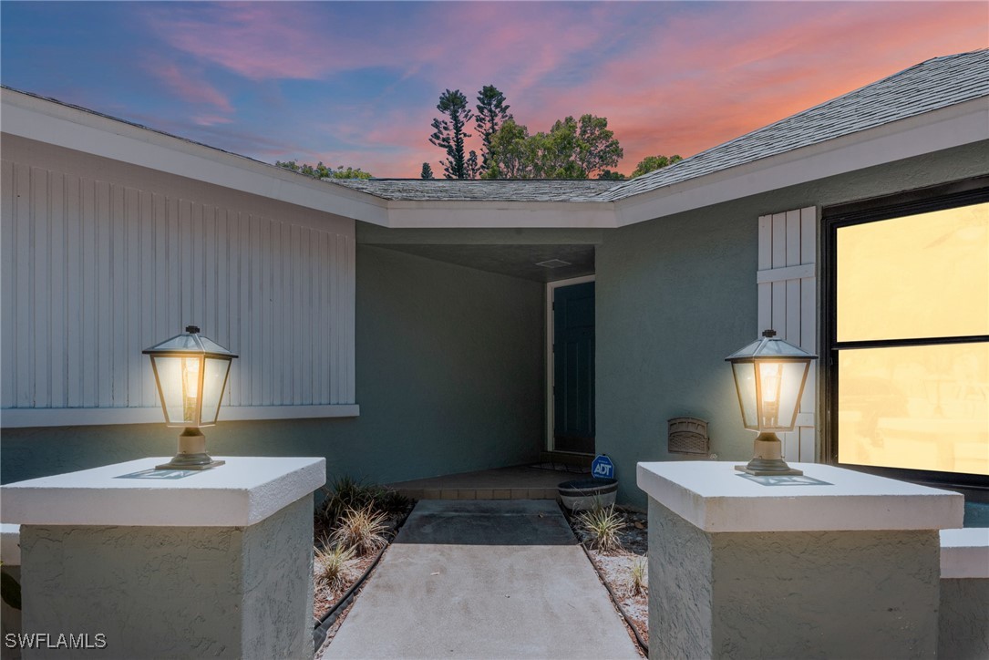 12331 McGregor Boulevard Fort Myers, FL 33919 - Photo 2 of 46 a kitchen with a sink and a stove