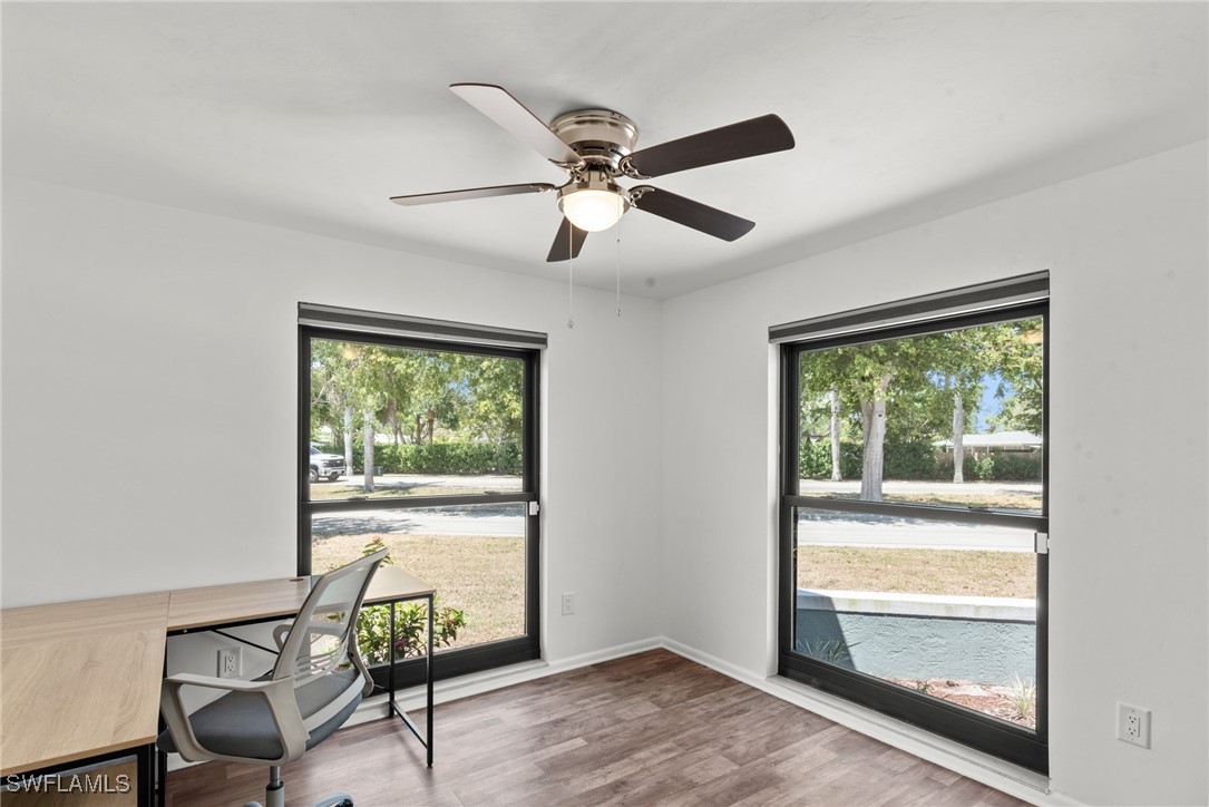 12331 McGregor Boulevard Fort Myers, FL 33919 - Photo 26 of 46 a living room with furniture and a window