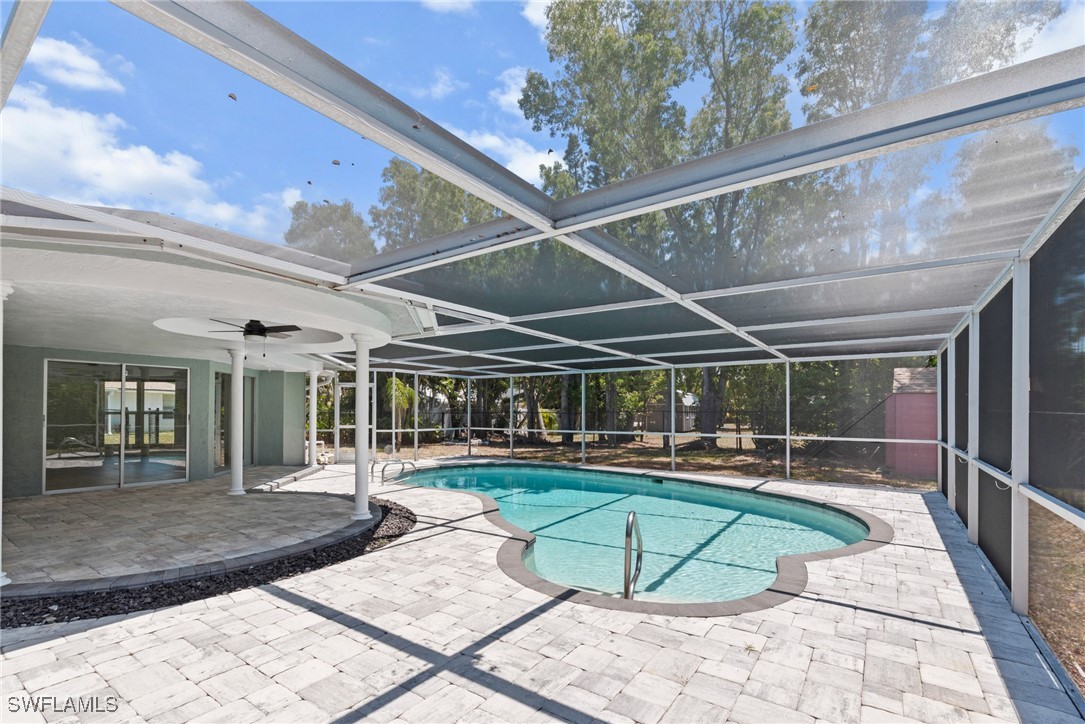12331 McGregor Boulevard Fort Myers, FL 33919 - Photo 33 of 46 a view of a swimming pool with a patio