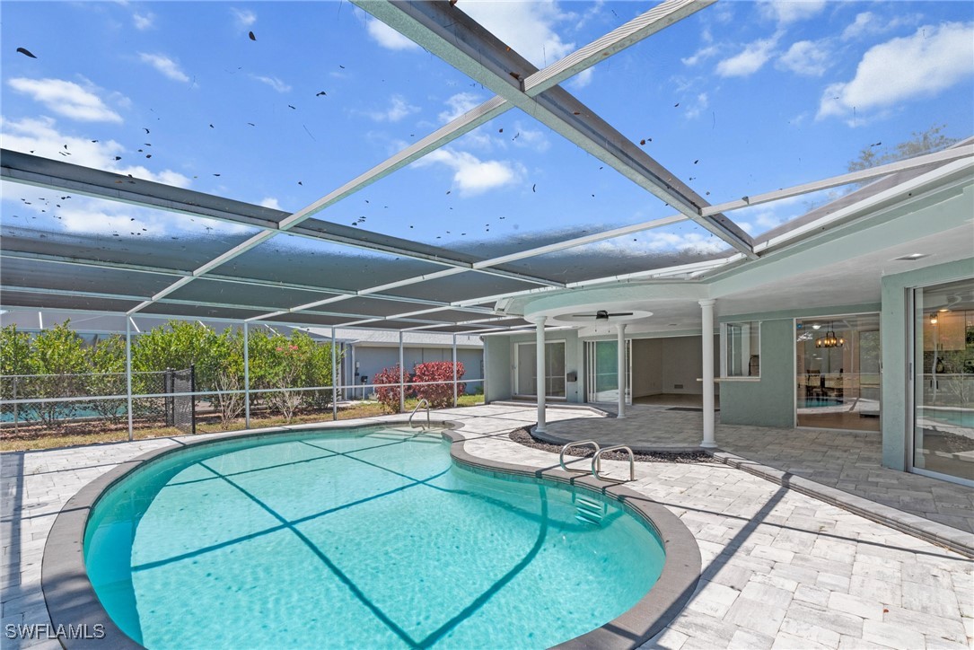 12331 McGregor Boulevard Fort Myers, FL 33919 - Photo 36 of 46 a room with lots of gym equipment