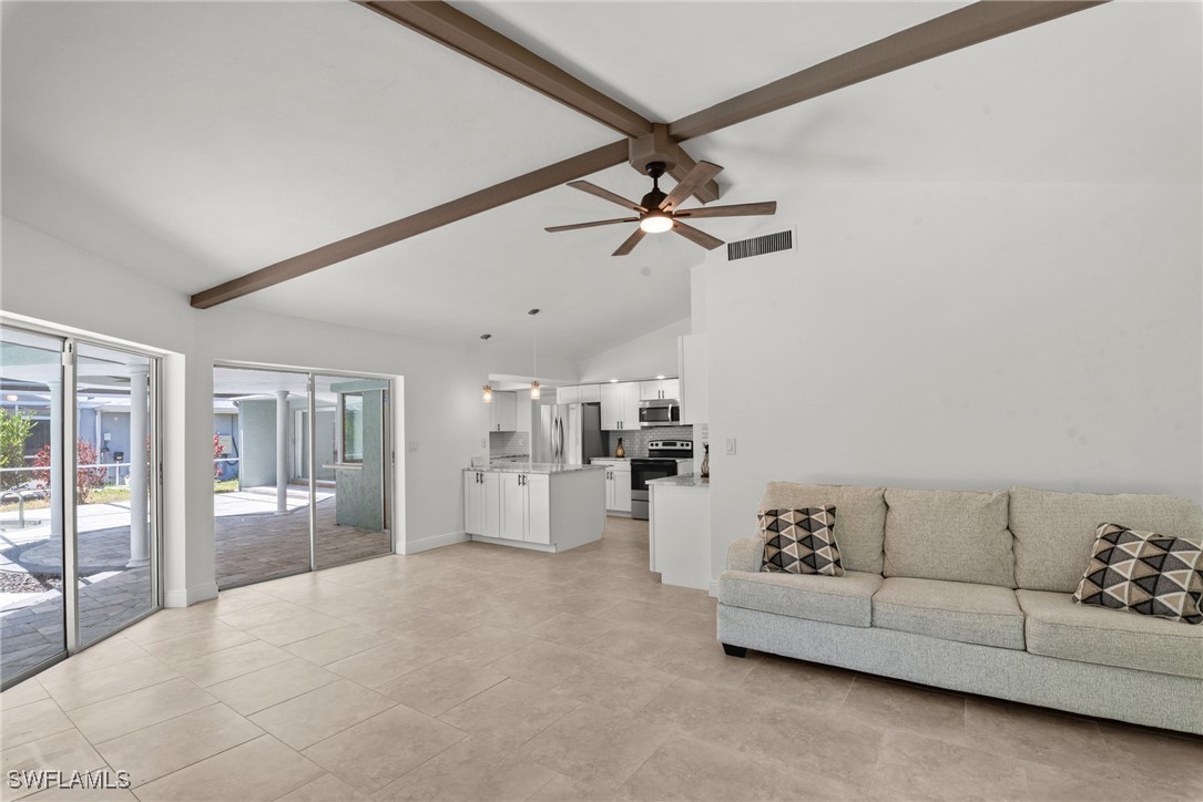 12331 McGregor Boulevard Fort Myers, FL 33919 - Photo 6 of 46 a living room with furniture and kitchen view