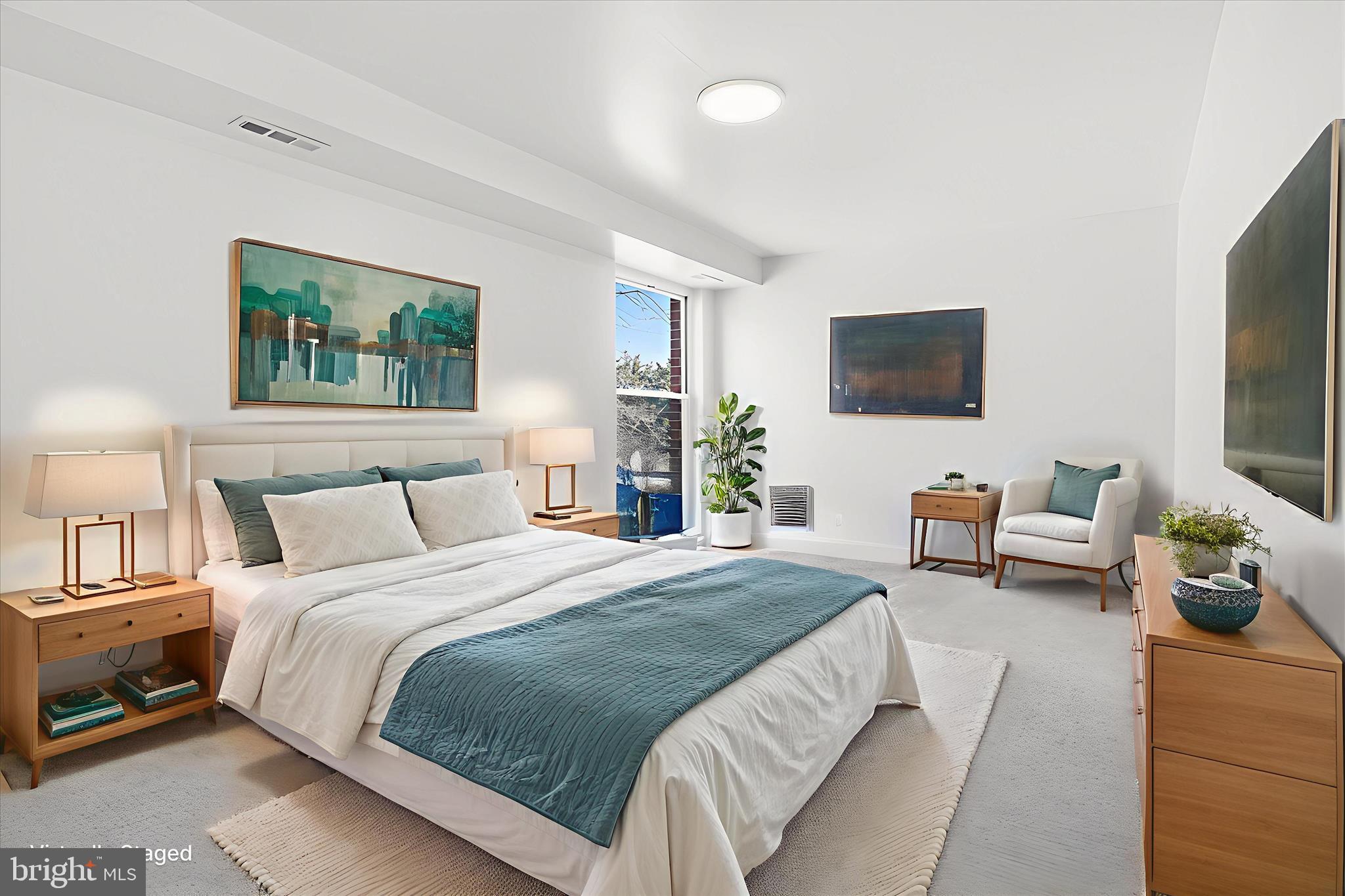 8300 Tobin Road, Unit 23 Annandale, VA 22003 - Photo 11 of 37 a bedroom with a bed and a flat screen tv