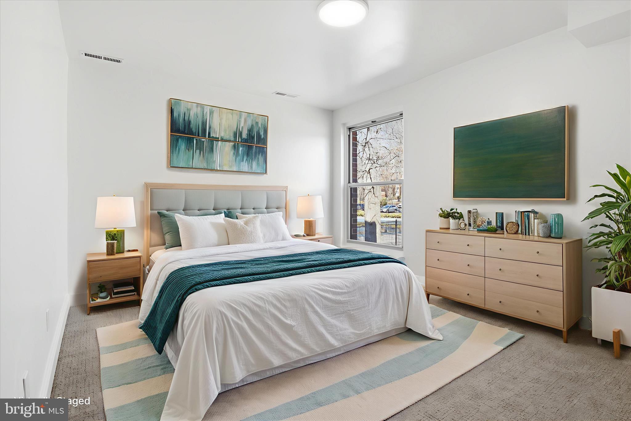 8300 Tobin Road, Unit 23 Annandale, VA 22003 - Photo 15 of 37 a bedroom with a bed and a flat screen tv