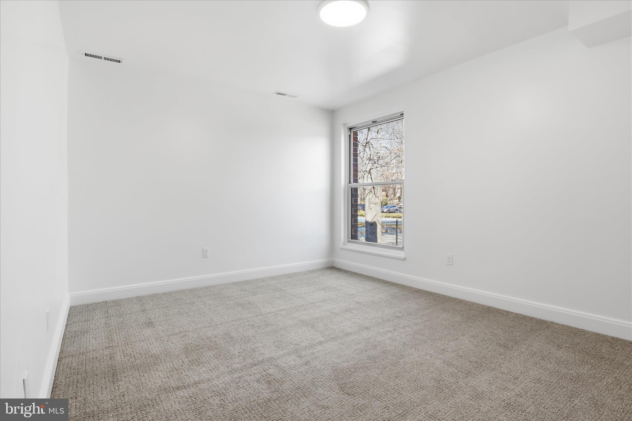 8300 Tobin Road, Unit 23 Annandale, VA 22003 - Photo 16 of 37 an empty room with windows