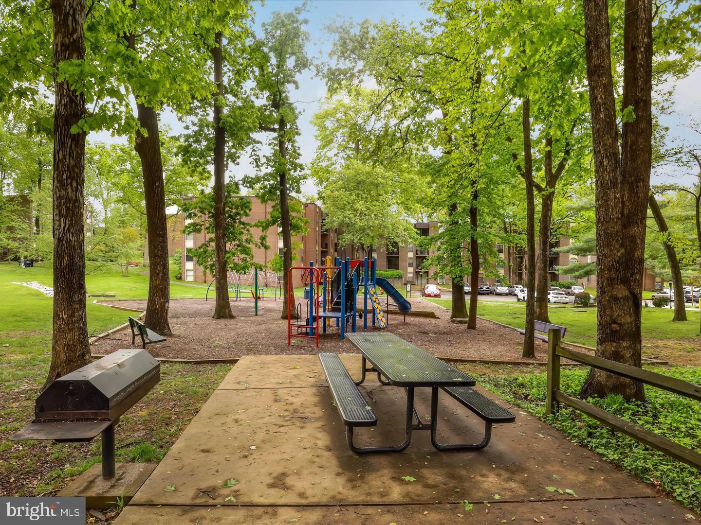 8300 Tobin Road, Unit 23 Annandale, VA 22003 - Photo 28 of 37 a view of a swimming pool with lounge chairs