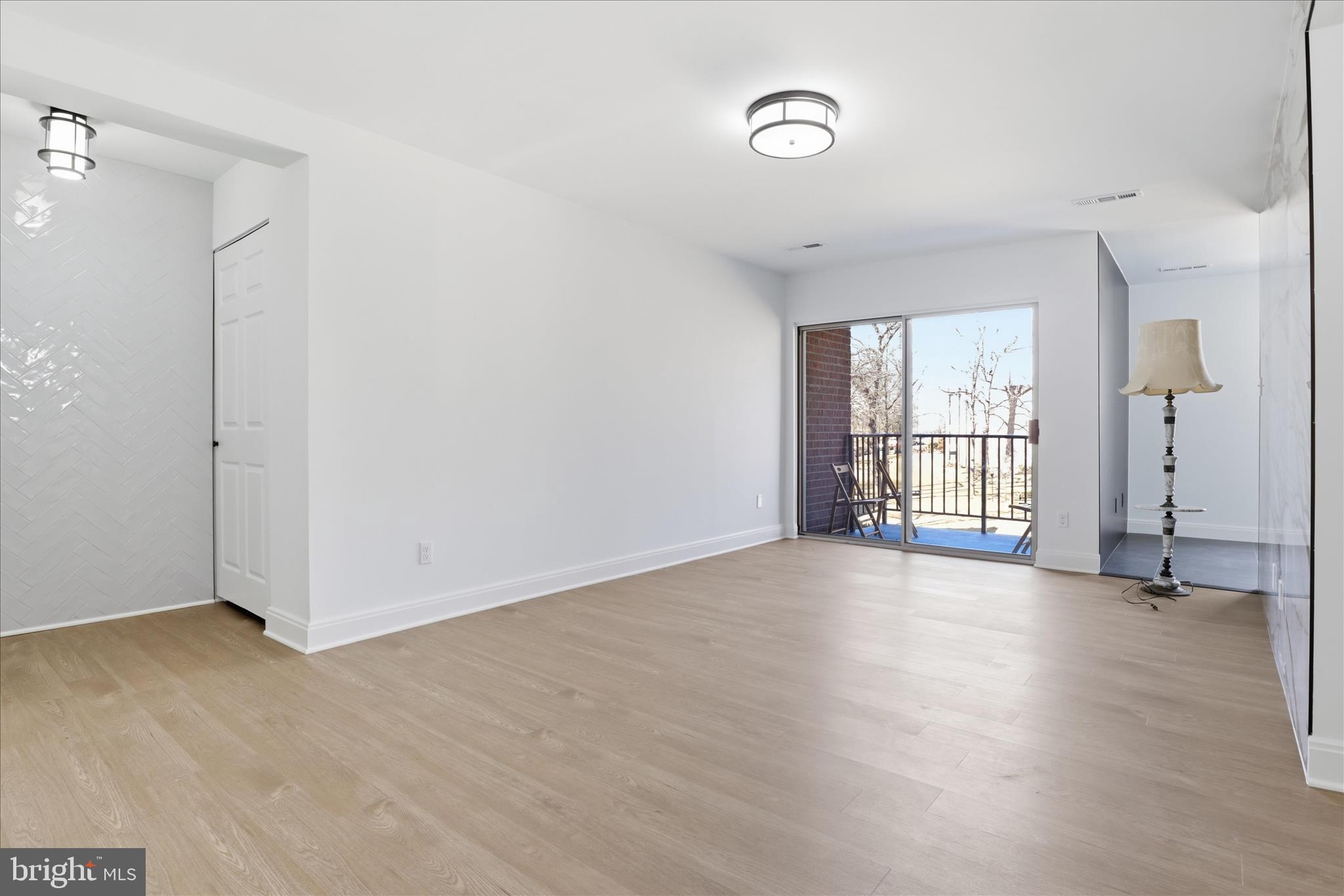 8300 Tobin Road, Unit 23 Annandale, VA 22003 - Photo 3 of 37 a view of an empty room with a window