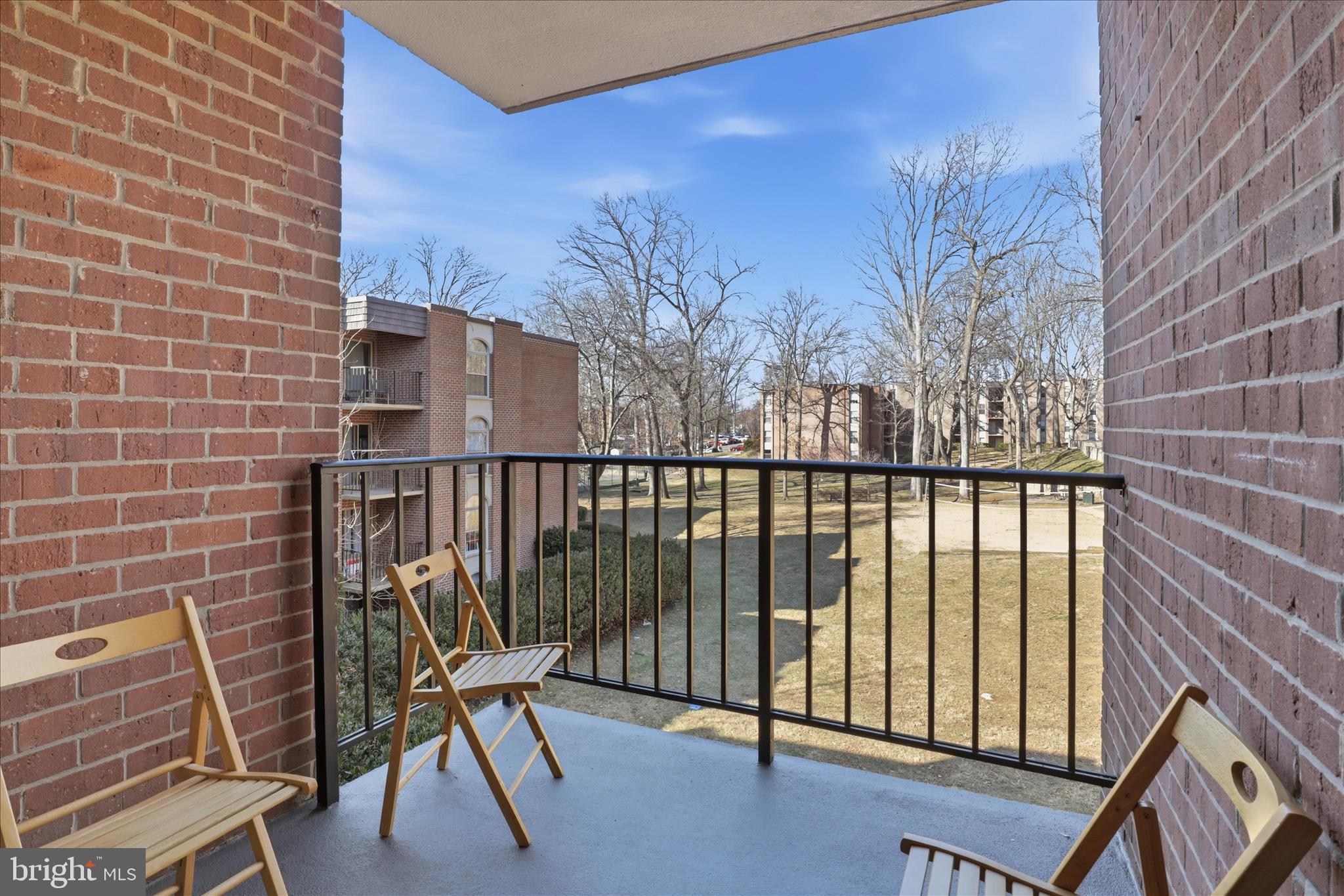 8300 Tobin Road, Unit 23 Annandale, VA 22003 - Photo 9 of 37 a view of a balcony with two chairs