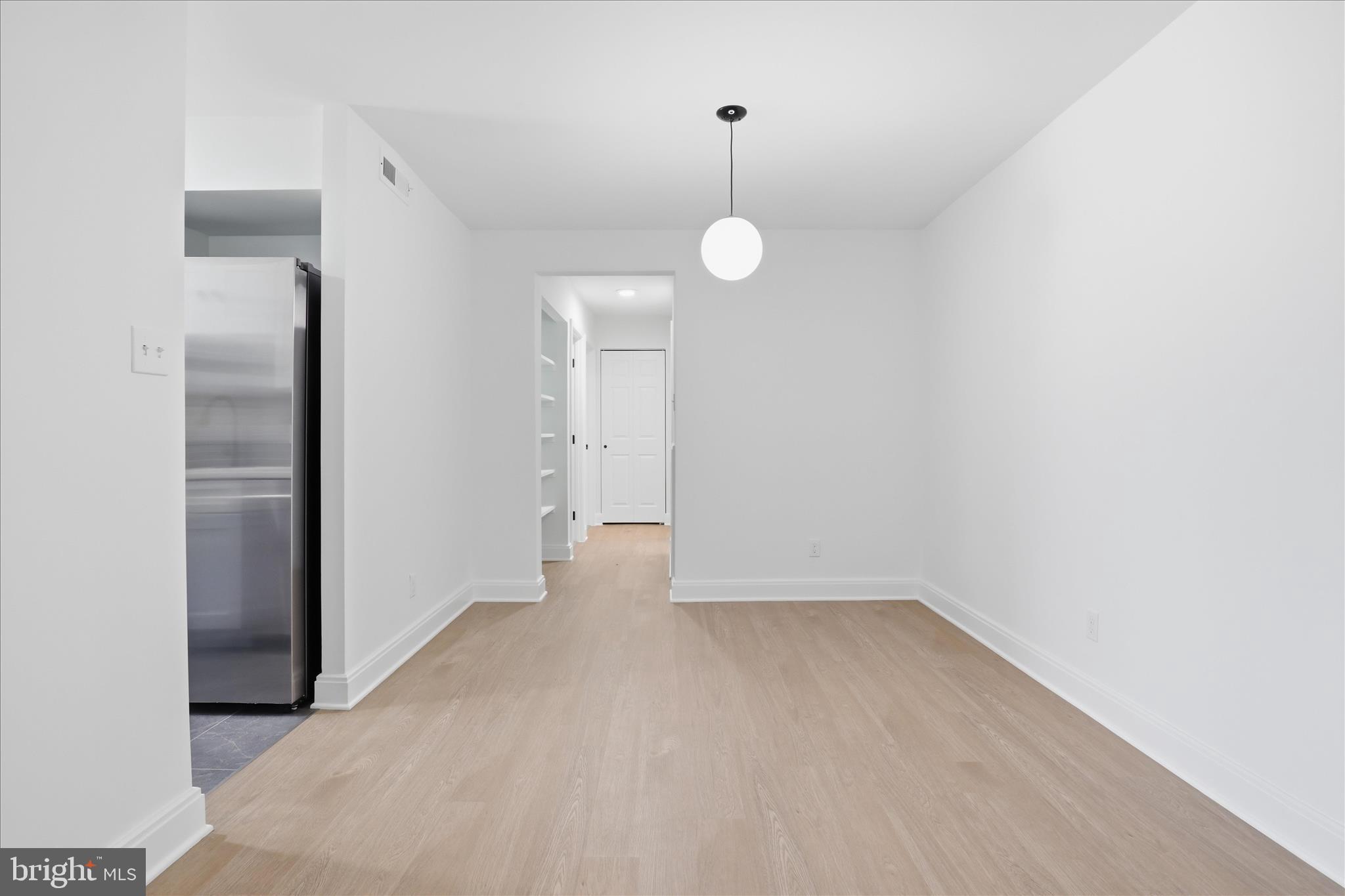 8300 Tobin Road, Unit 23 Annandale, VA 22003 - Photo 10 of 37 an empty room with a empty space and a ceiling fan