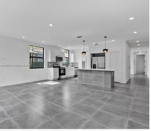 a view of a kitchen with a sink