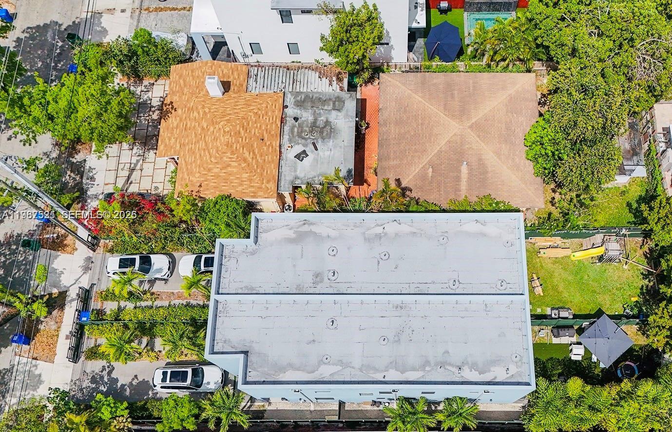 2737 Southwest 2nd Street, Unit 1 Miami, FL 33135 - Photo 24 of 25 an aerial view of a house with a garden and swimming pool