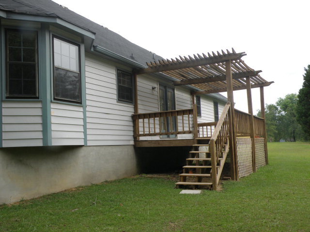 210 J R Boulevard Macon, GA 31220 - Photo 17 of 19 a view of a house with a yard