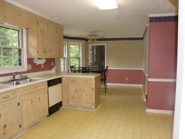 210 J R Boulevard Macon, GA 31220 - Photo 6 of 19 a kitchen with sink and cabinets