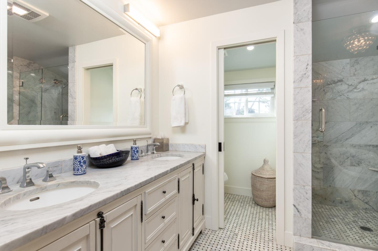 2 Black Tail Lane Monterey, CA 93940 - Photo 21 of 32 a bathroom with a sink a toilet and a mirror