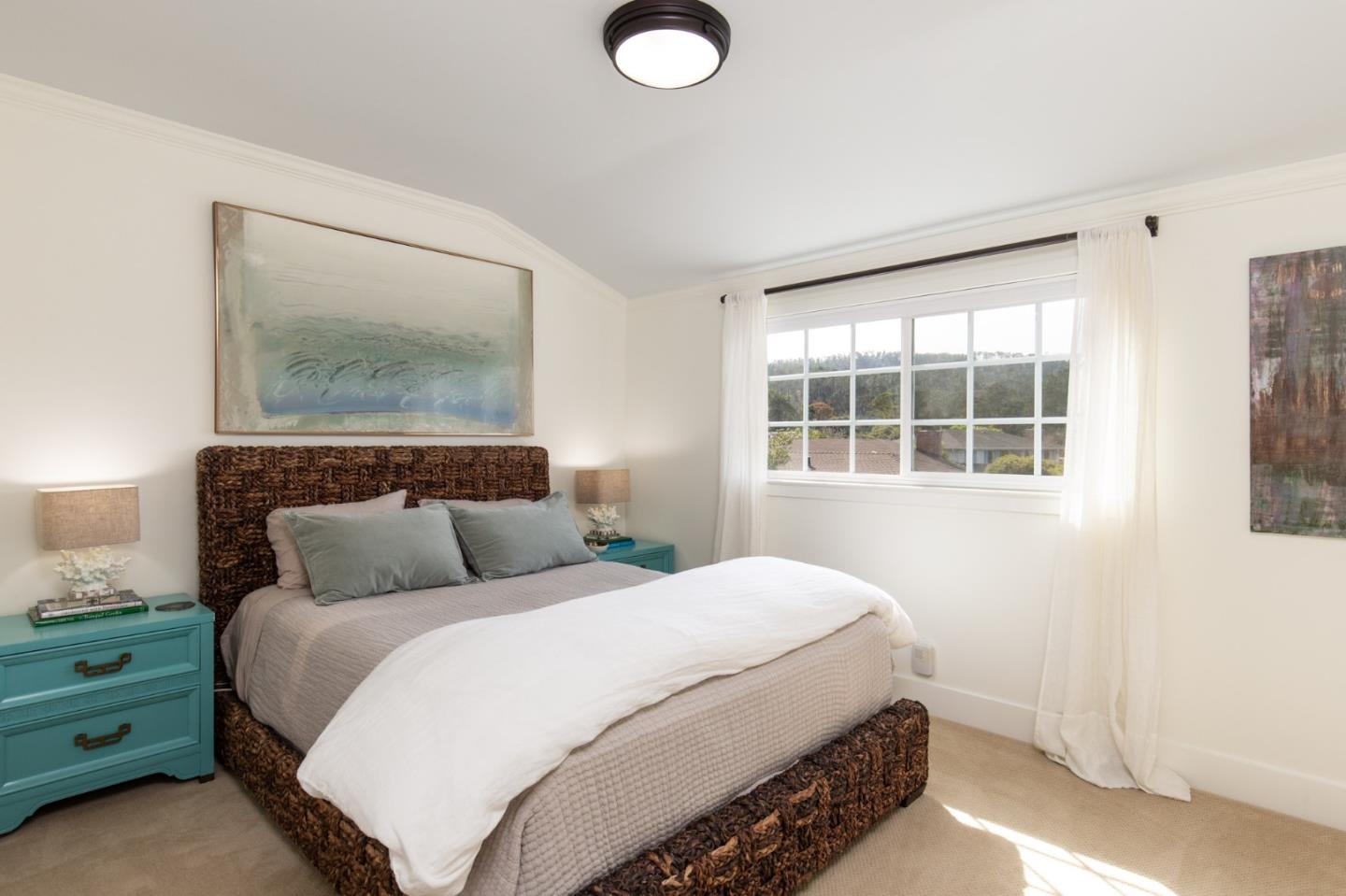 2 Black Tail Lane Monterey, CA 93940 - Photo 23 of 32 a bedroom with a bed and a window