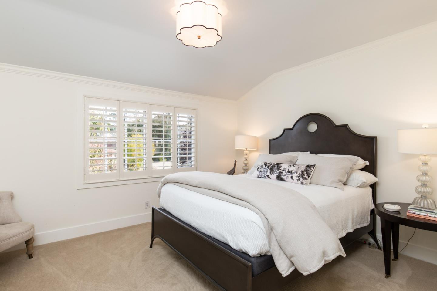 2 Black Tail Lane Monterey, CA 93940 - Photo 24 of 32 a bedroom with a bed and a window