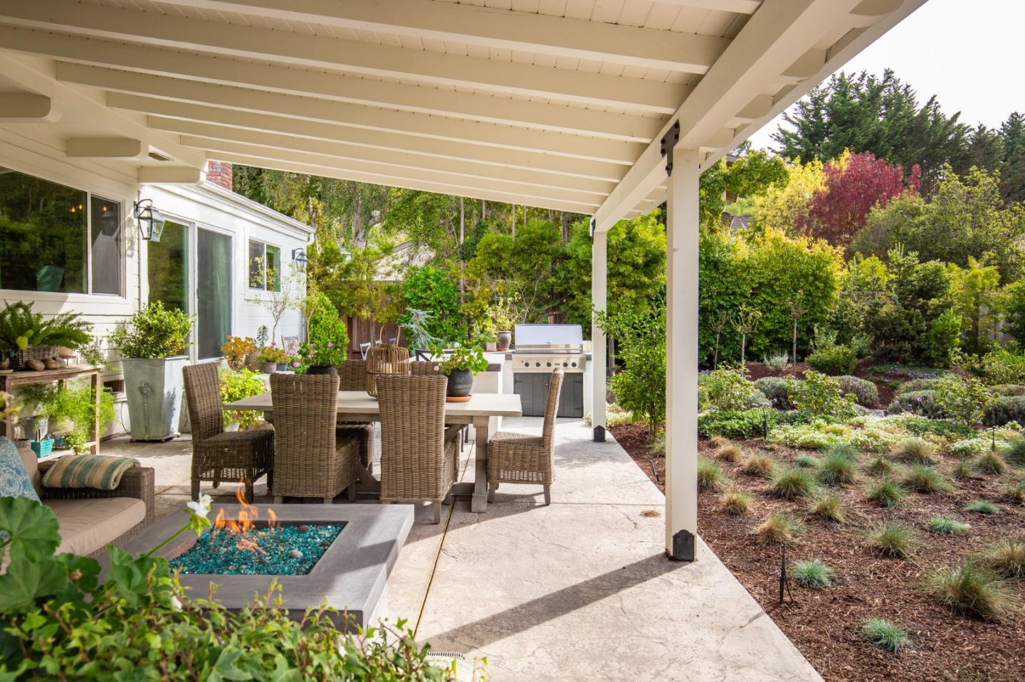 2 Black Tail Lane Monterey, CA 93940 - Photo 26 of 32 a view of a patio with table and chairs and potted plants