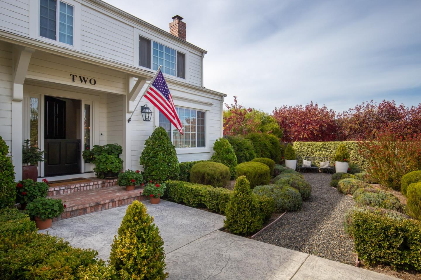 2 Black Tail Lane Monterey, CA 93940 - Photo 3 of 32 a front view of a house with a yard