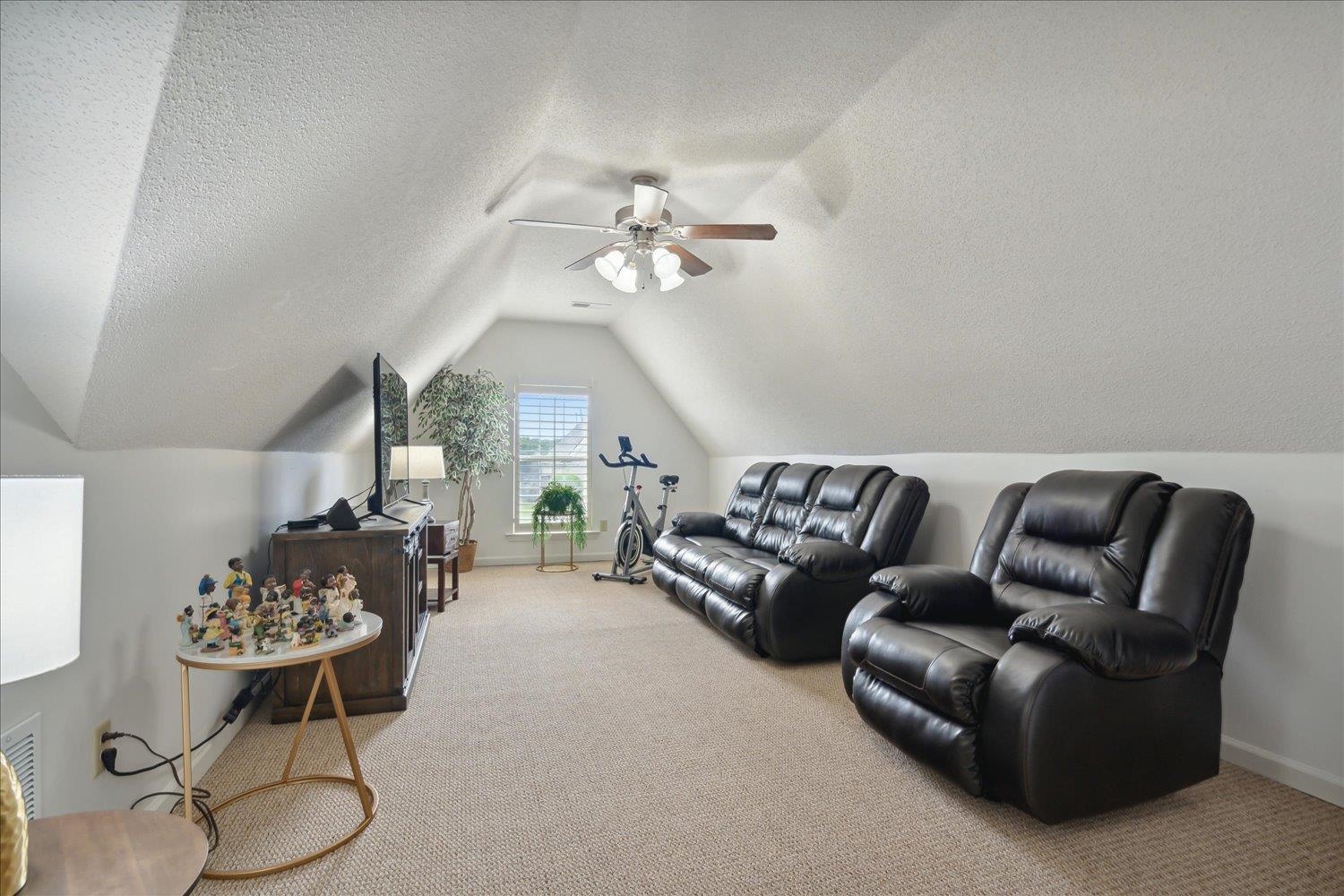 7464 Britt Way Memphis, TN 38125 - Photo 24 of 29 a living room with furniture chandelier and a chandelier
