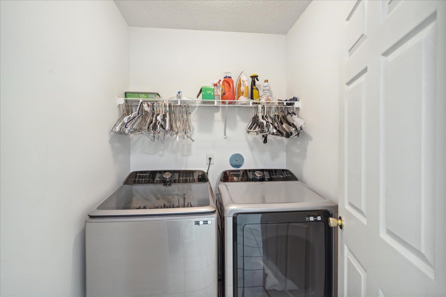 7464 Britt Way Memphis, TN 38125 - Photo 25 of 29 a utility room with dryer and washer