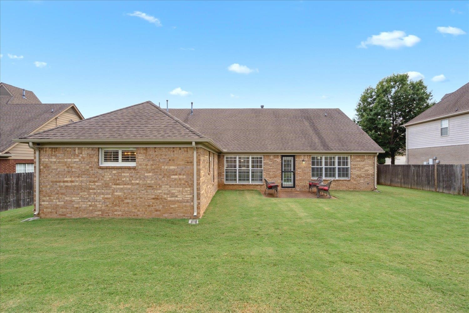 7464 Britt Way Memphis, TN 38125 - Photo 28 of 29 a view of a house with a yard and sitting area