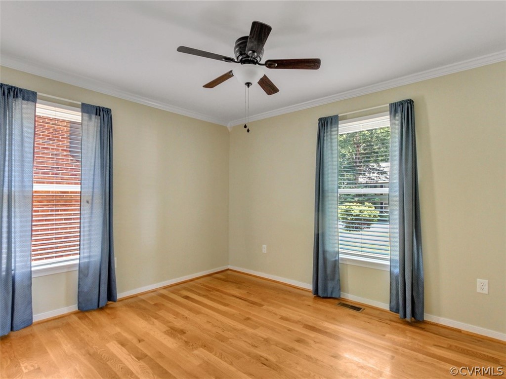5509 Chatmoss Road Midlothian, VA 23112 - Photo 15 of 38 a view of a room with a ceiling fan and a window