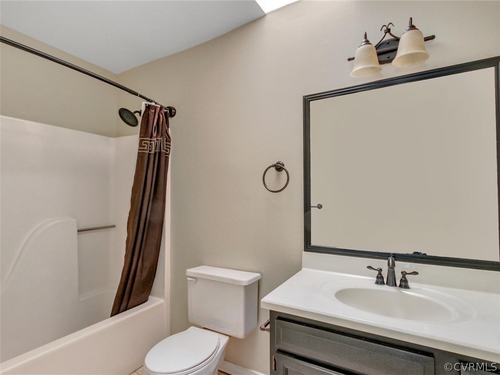 5509 Chatmoss Road Midlothian, VA 23112 - Photo 17 of 38 a bathroom with a sink toilet and shower