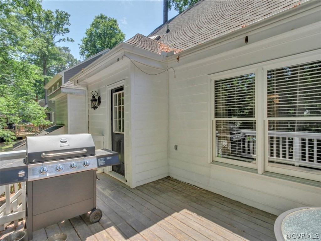 5509 Chatmoss Road Midlothian, VA 23112 - Photo 23 of 38 a view of a deck with wooden floor and fence