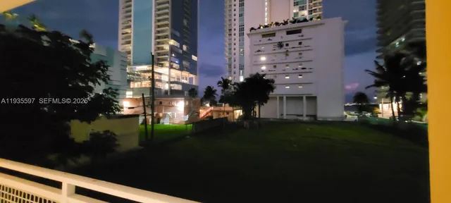 a view of building with yard