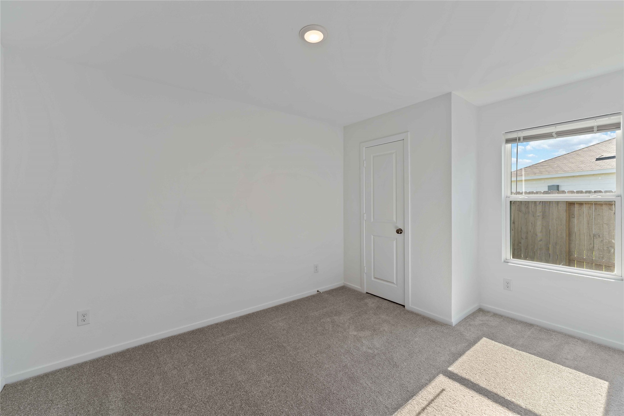 21002 Longwitton Lane Humble, TX 77338 - Photo 21 of 26 an empty room with a window