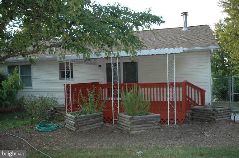 2130 Sebastian Road Fredericksburg, VA 22405 - Photo 16 of 16 Covered deck and raised flower beds