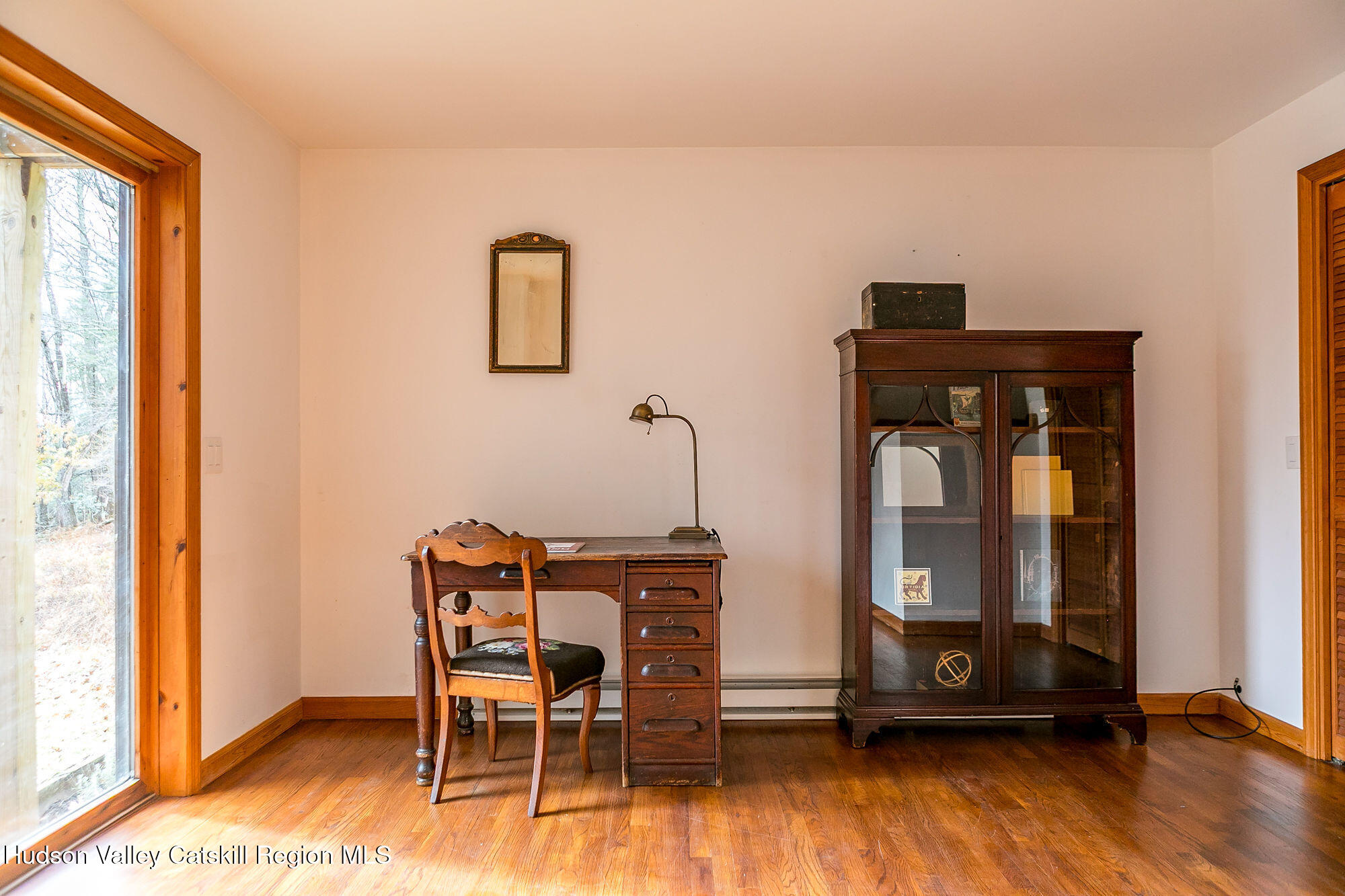 446 Abbey Road Woodstock, NY 12457 - Photo 15 of 32 a dining room with furniture and wooden floor