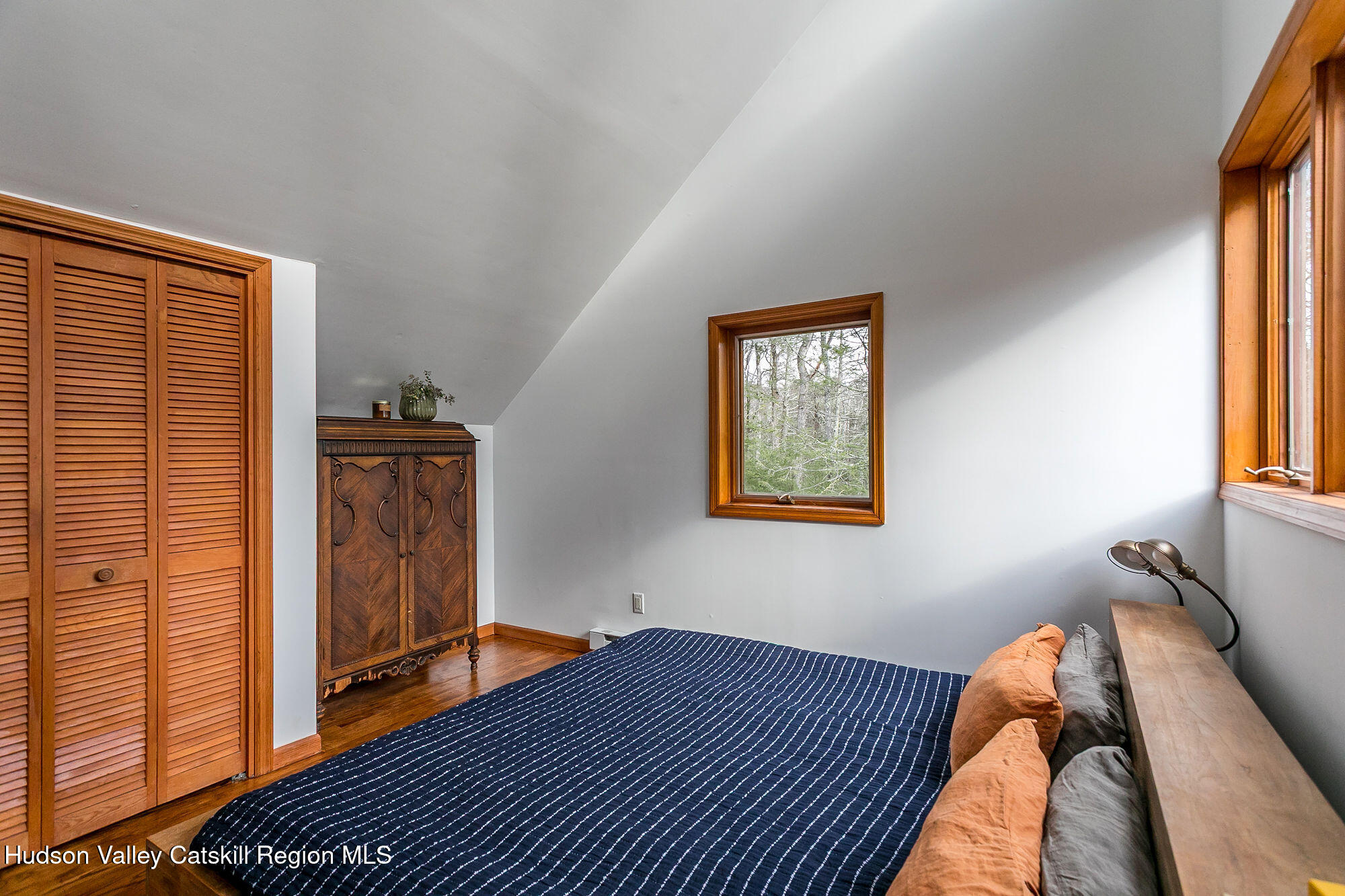 446 Abbey Road Woodstock, NY 12457 - Photo 18 of 32 a bedroom with a bed and a window