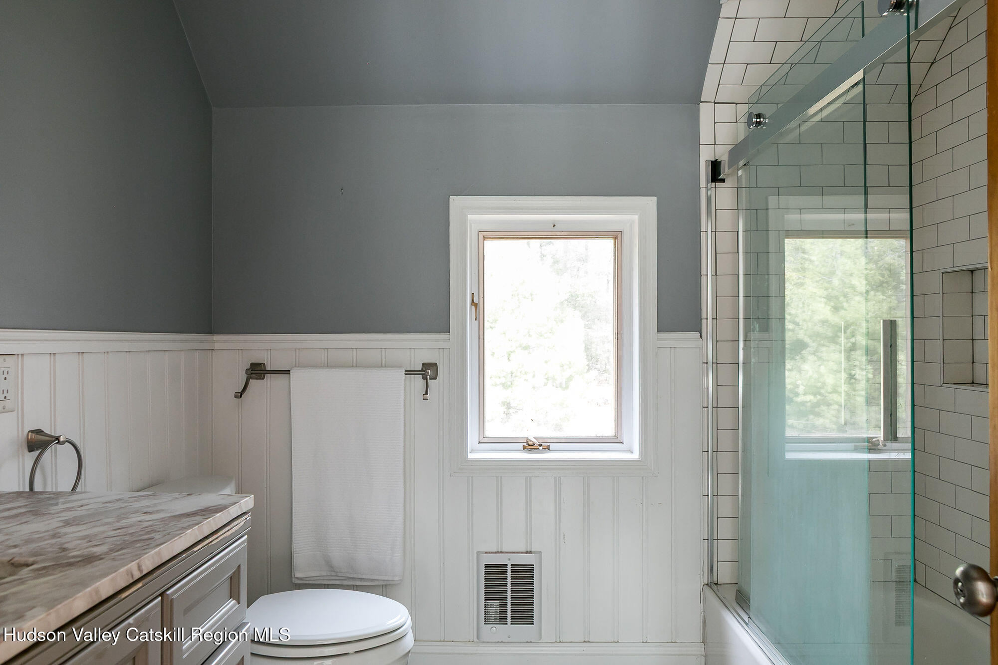 446 Abbey Road Woodstock, NY 12457 - Photo 20 of 32 a bathroom with a granite countertop sink toilet and shower