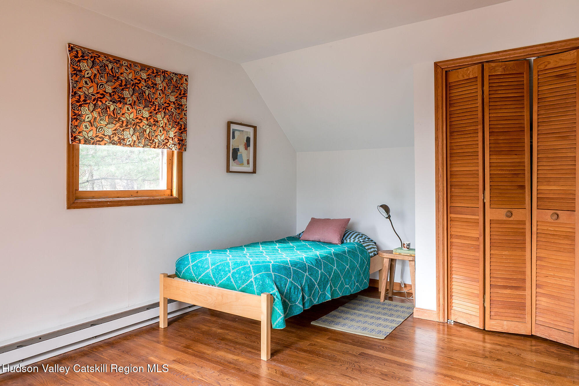 446 Abbey Road Woodstock, NY 12457 - Photo 23 of 32 a room that has a bed and a window