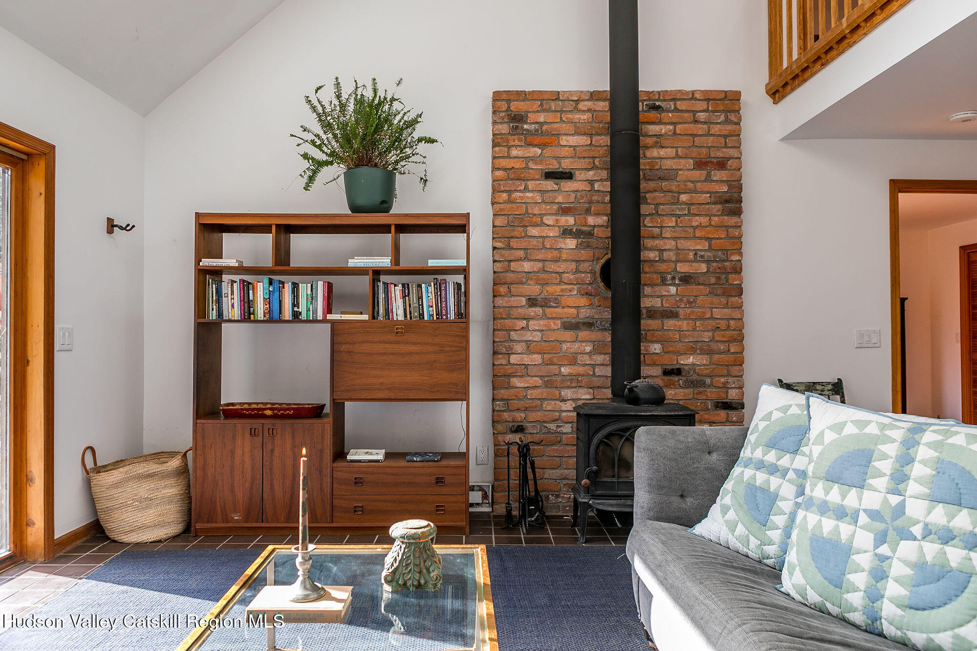 446 Abbey Road Woodstock, NY 12457 - Photo 3 of 32 a living room with furniture and a book shelf