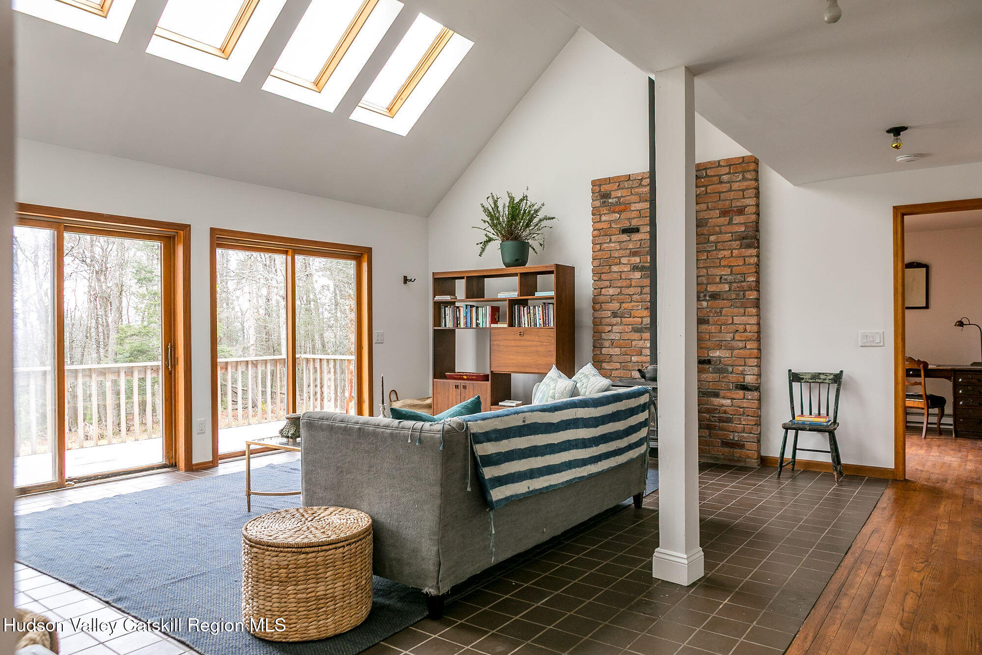 446 Abbey Road Woodstock, NY 12457 - Photo 6 of 32 a living room with furniture and wooden floor