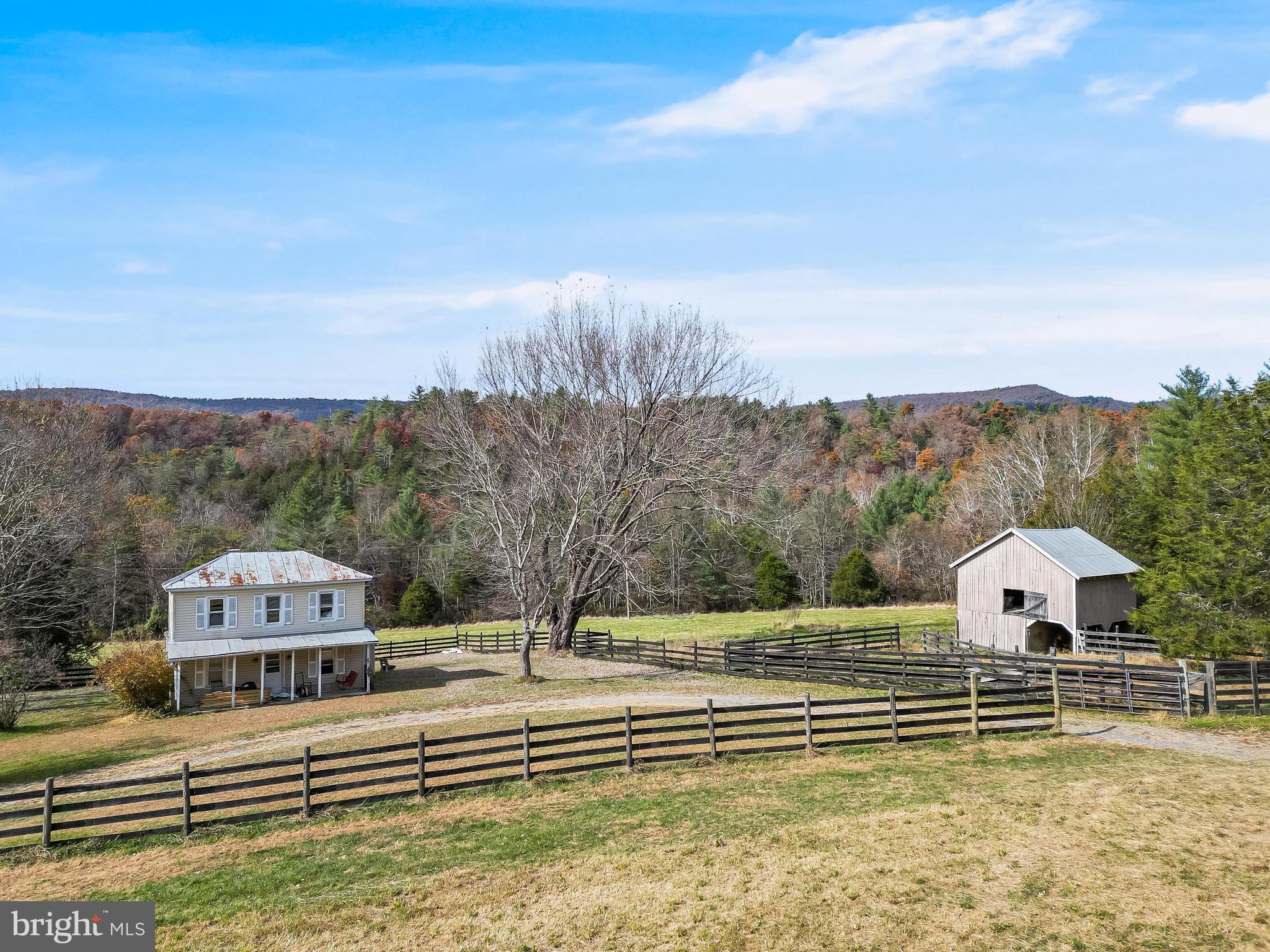 19442 Runions Creek Road Broadway, VA 22815 - Photo 24 of 24 a view of a house with a yard from a balcony