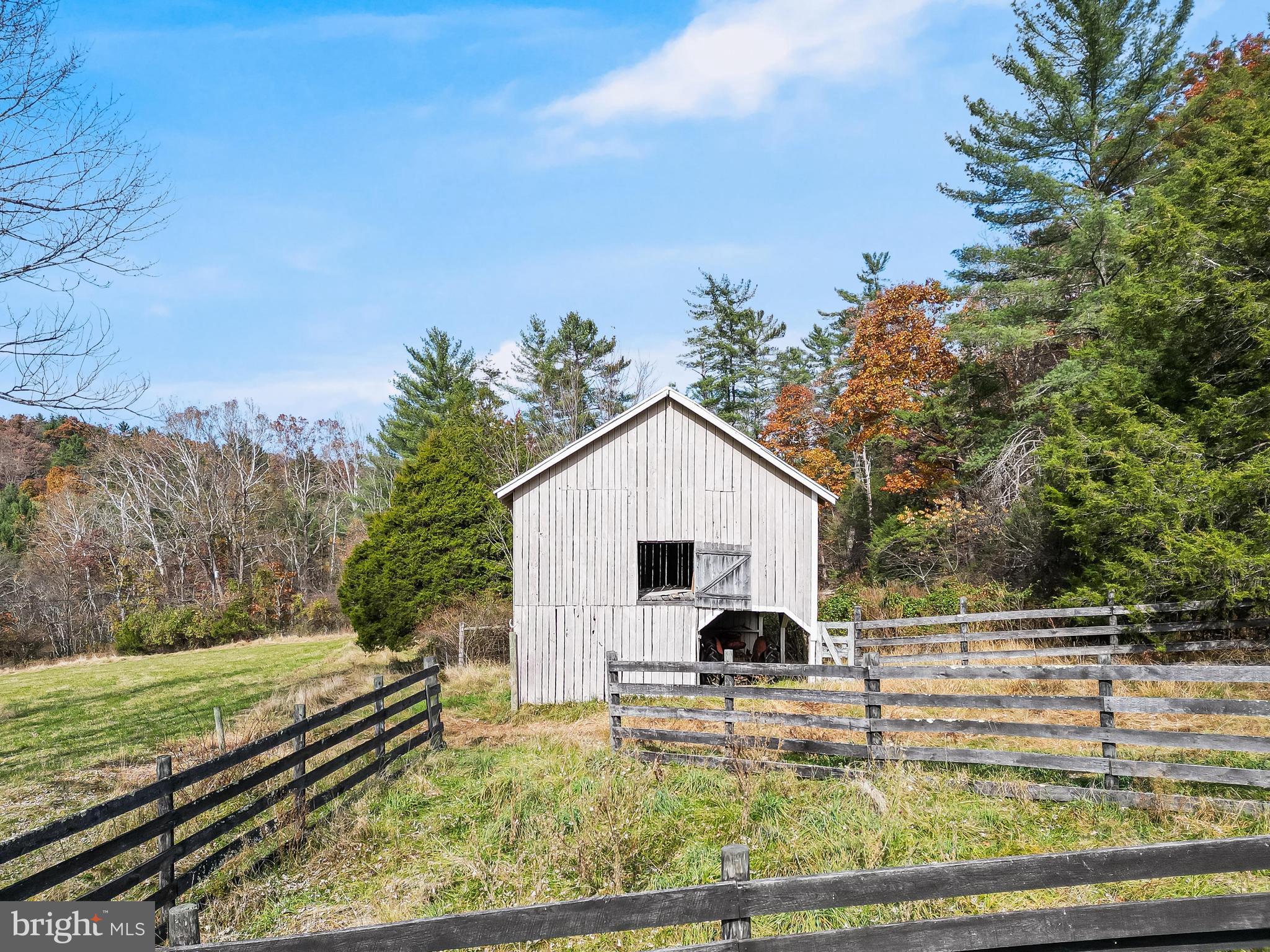 19442 Runions Creek Road Broadway, VA 22815 - Photo 5 of 24 a view of a yard with wooden fence