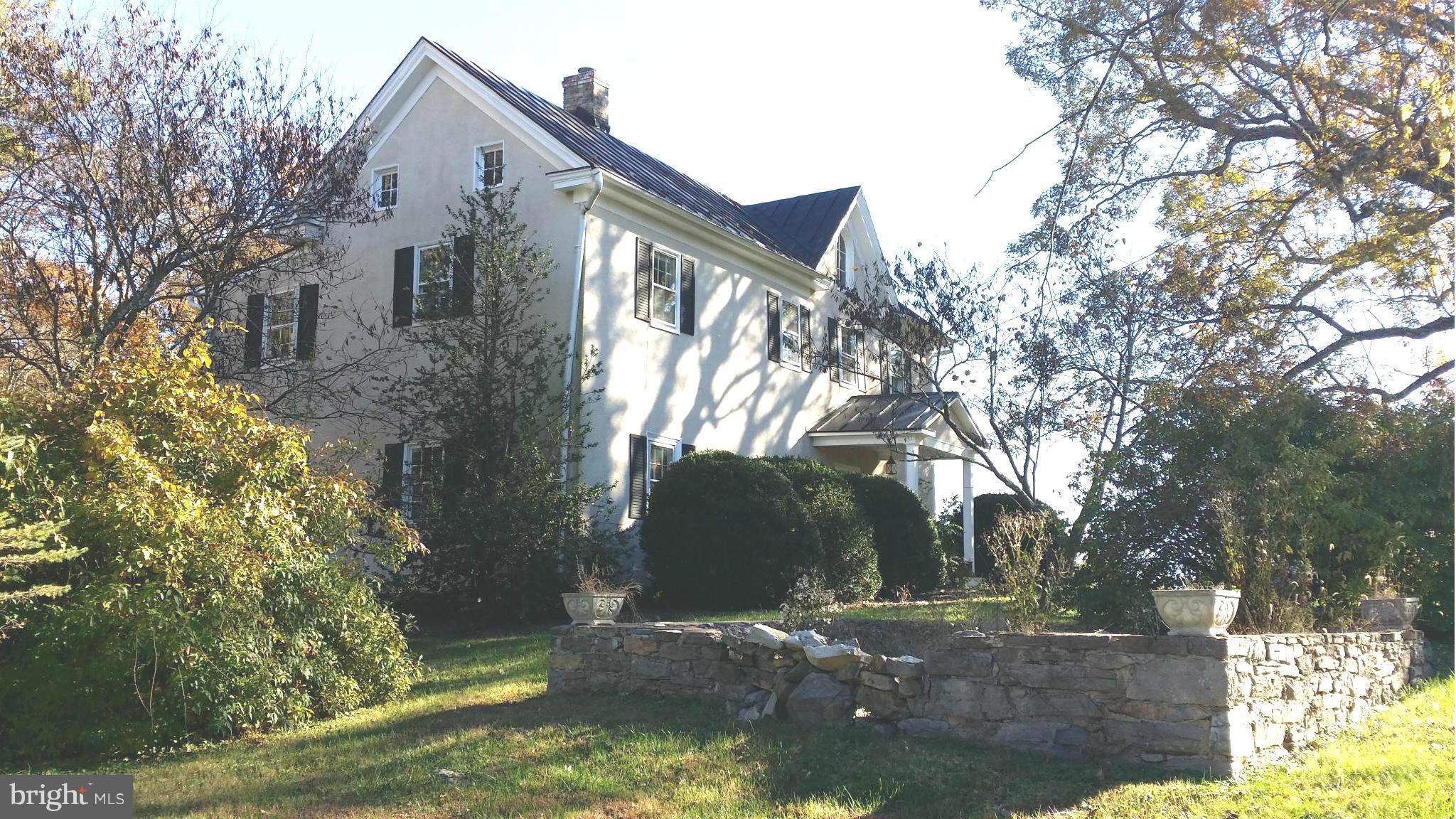 1550 Bishop Meade Road Boyce, VA 22620 - Photo 2 of 24 a view of a house with a yard