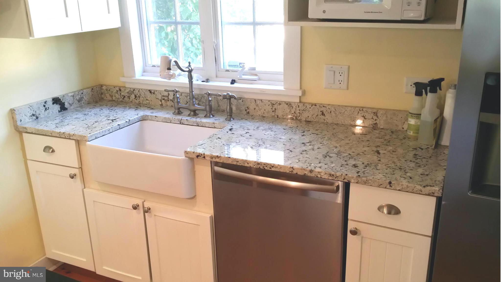1550 Bishop Meade Road Boyce, VA 22620 - Photo 13 of 24 a view of granite countertop cabinets sink and window