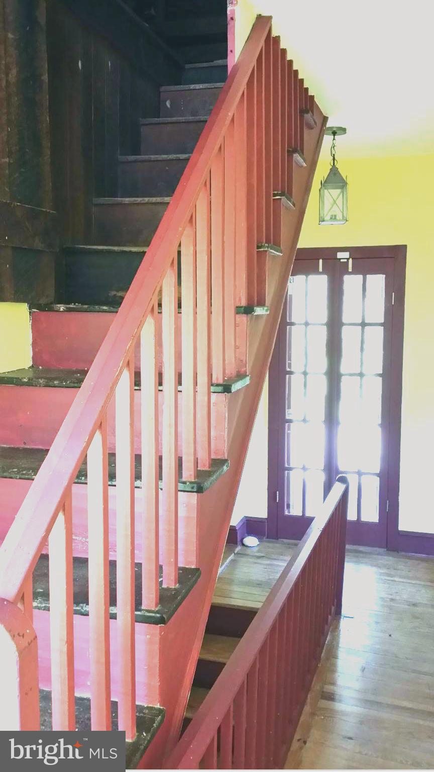 1550 Bishop Meade Road Boyce, VA 22620 - Photo 24 of 24 a view of staircase with railing and a potted plant