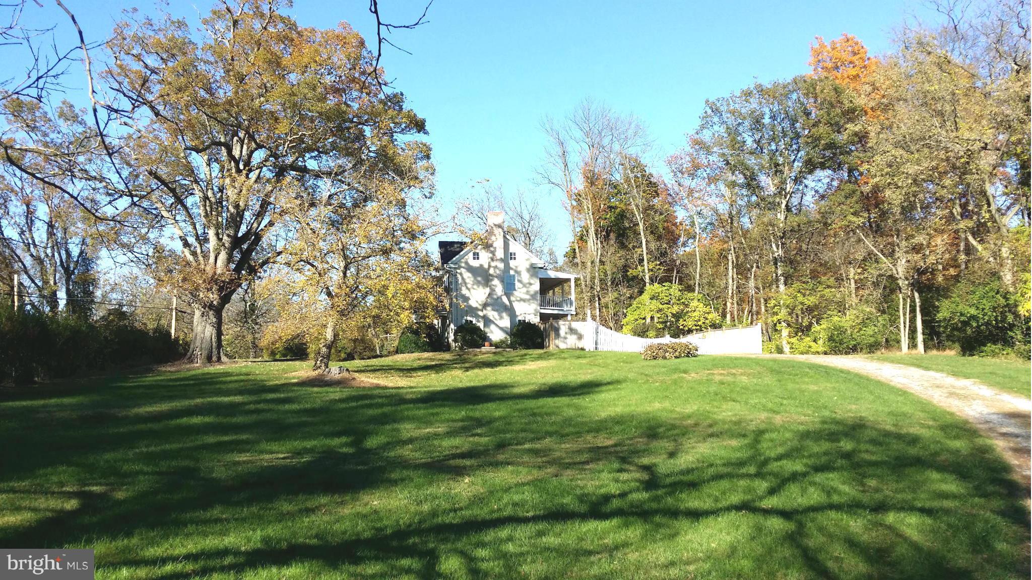 1550 Bishop Meade Road Boyce, VA 22620 - Photo 6 of 24 a backyard of apartments with large trees