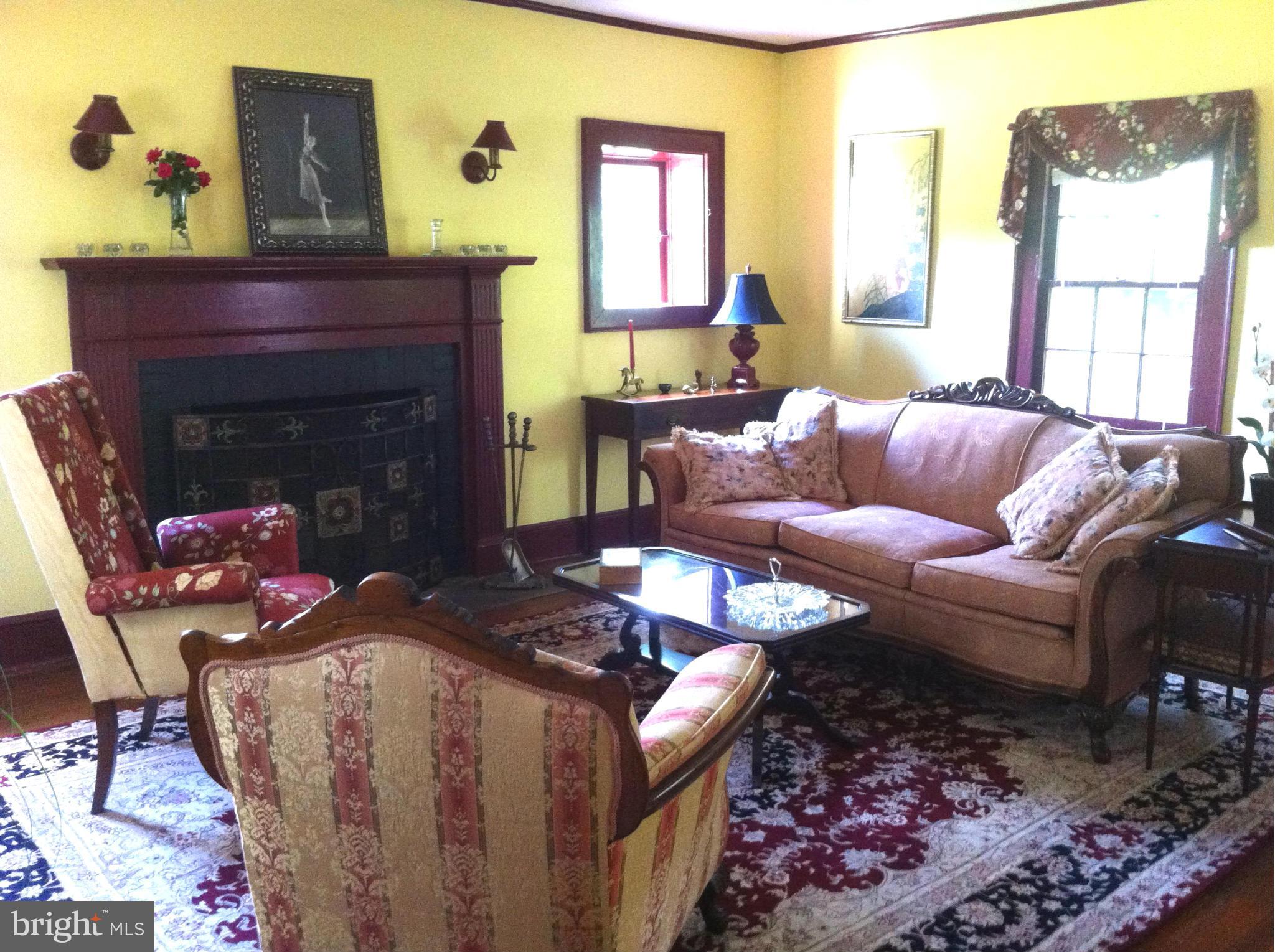 1550 Bishop Meade Road Boyce, VA 22620 - Photo 8 of 24 a living room with furniture and a fireplace