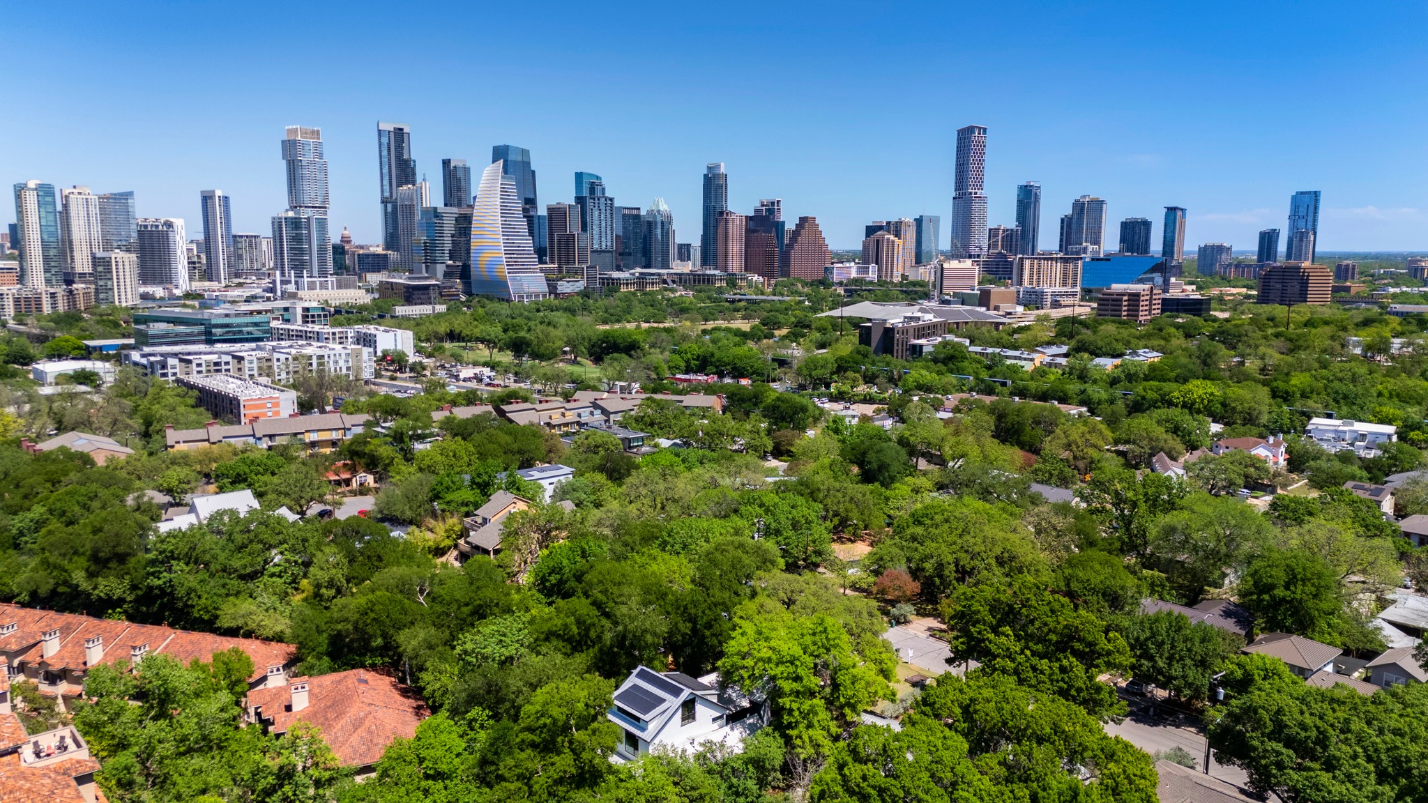 700 Jessie Street Austin, TX 78704 - Photo 40 of 40 Skyline view featuring a tree filled landscape