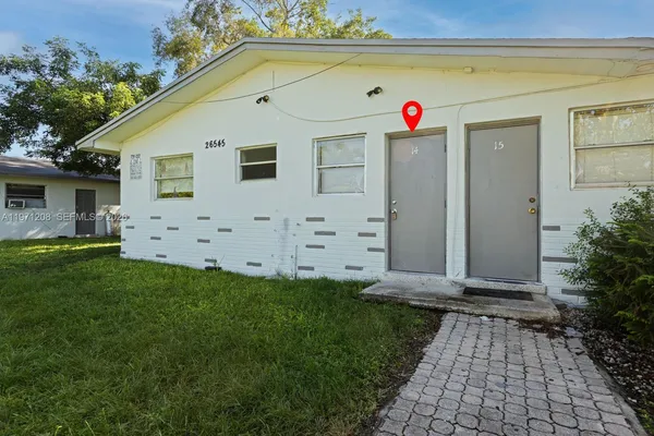 a front view of house with yard