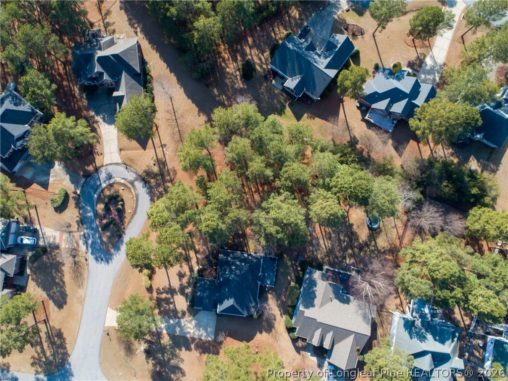 34 Old Pine Court Spring Lake, NC 28390 - Photo 2 of 4 an aerial view of a house with a yard and garden