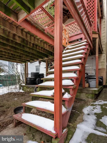 a view of balcony with wooden floor