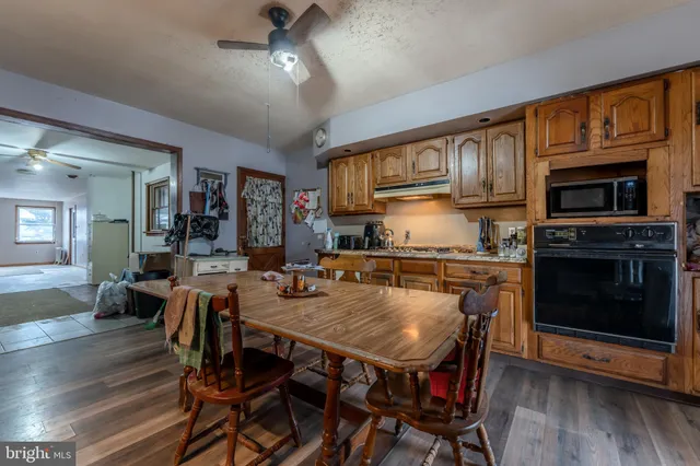 a view of a dining room with furniture